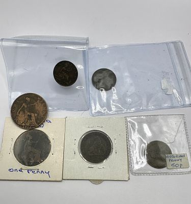 A Collection of British and International Historical Coins and Tokens. A collection of British 