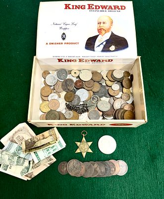 A Collection of International Numismatics and Militaria in a King Edward Cigar Box. A collection 