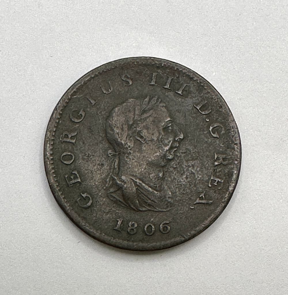 A George III Copper Halfpenny, 1806. A British George III copper halfpenny dated 1806 
