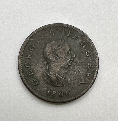 A George III Copper Halfpenny, 1806. A British George III copper halfpenny dated 1806 
