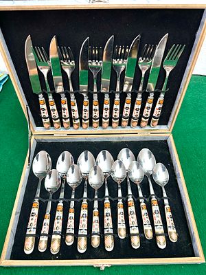 A 24-Piece Stainless Steel Canteen of Cutlery with Imari Style Ceramic Handles