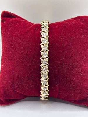 A 9 Carat Yellow Gold and Diamond S-Link Tennis Bracelet
