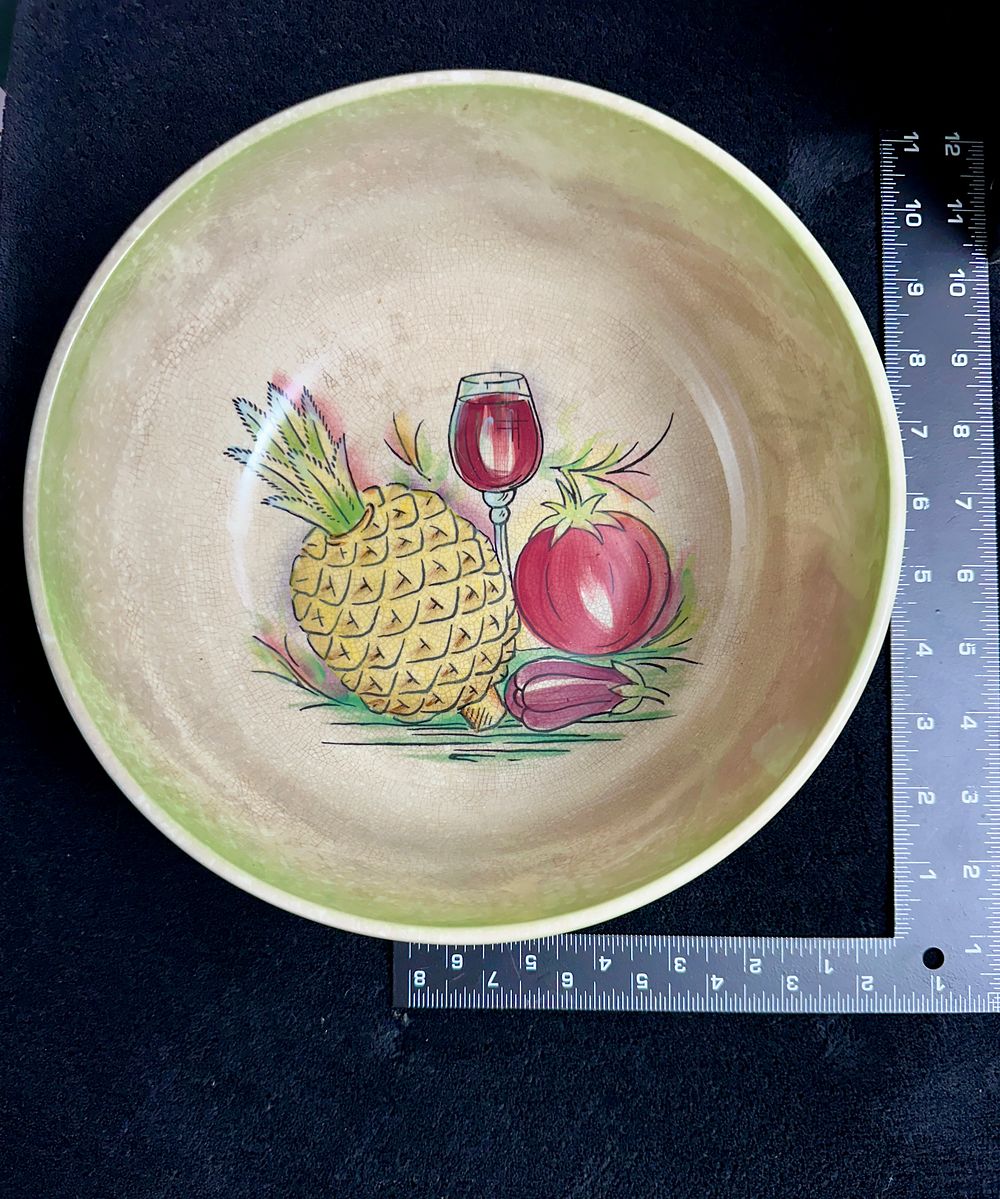 Lot 159: A mid-20th-century Beswick Ware earthenware fruit bowl with hand-painted still-life decoration