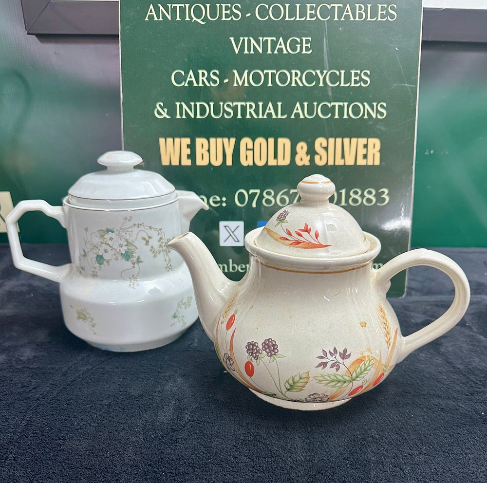 Lot 222: Two assorted ceramic teapots including one harvest themed example