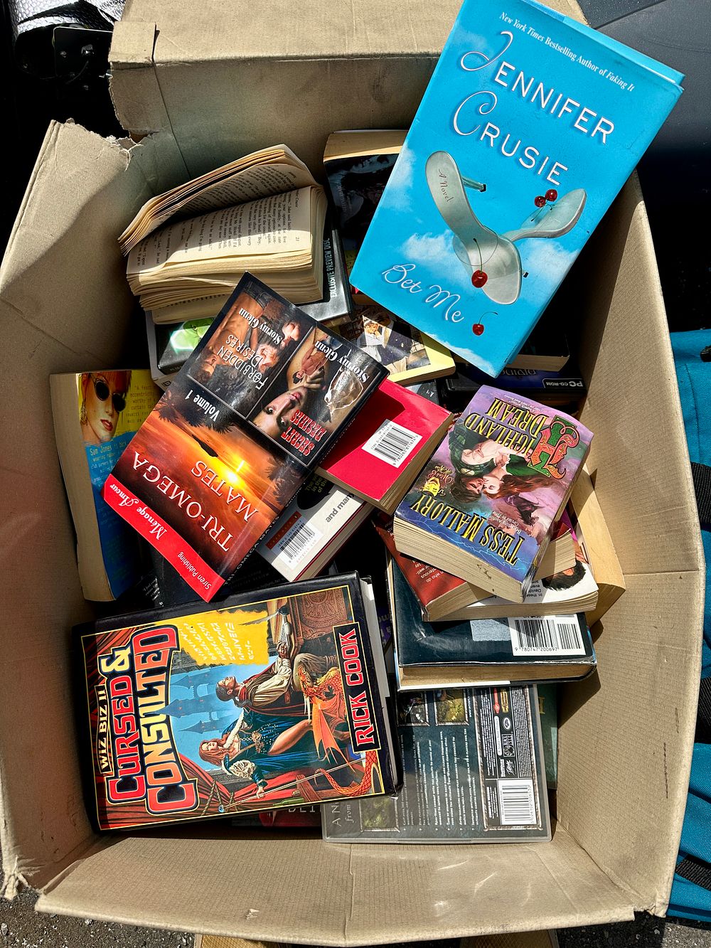 Lot 357: A Collection of Contemporary Fiction and Fantasy Softcover Books and Media