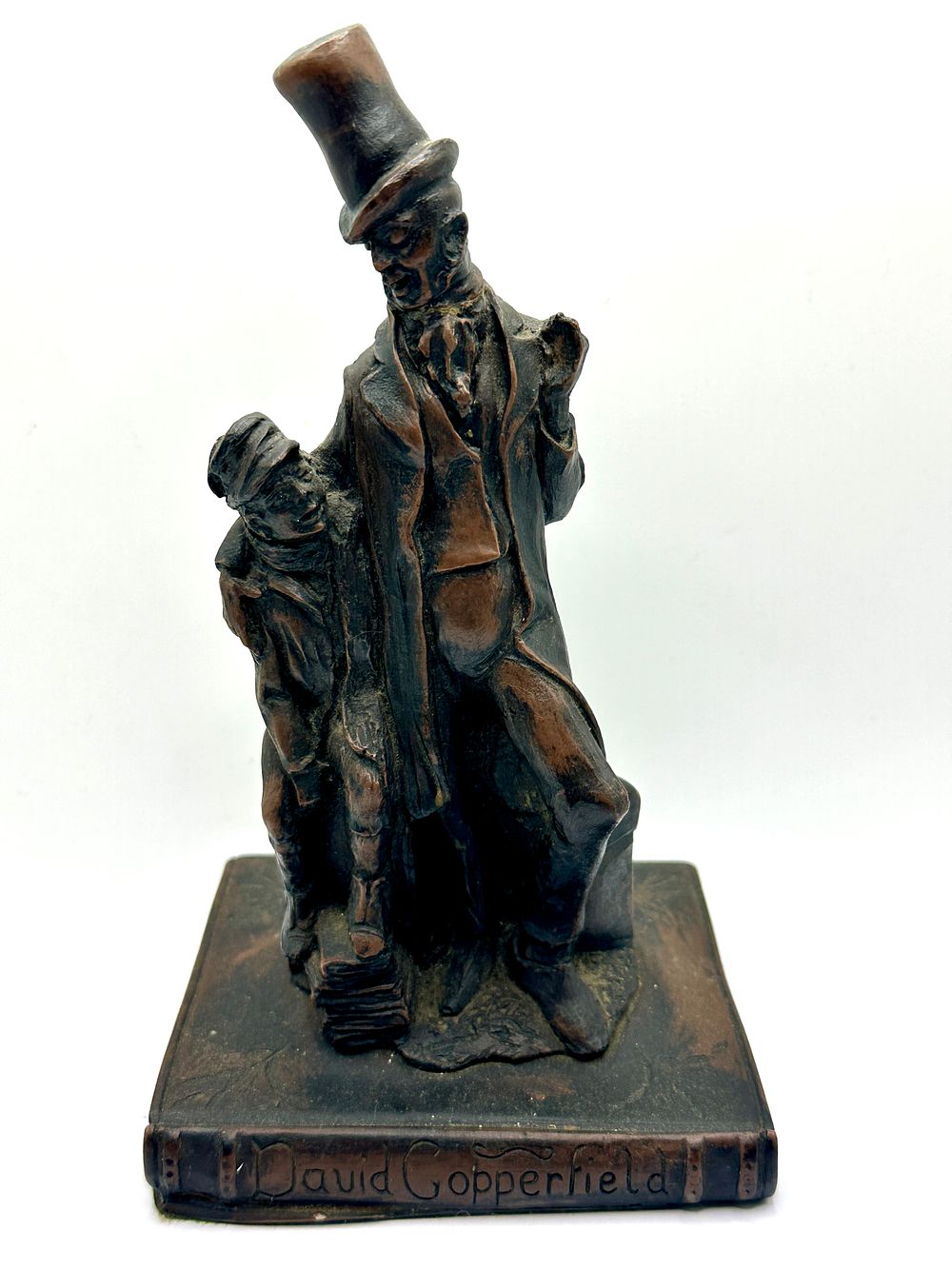 Lot 372: A 20th Century Cold-Cast Bronze-Effect Figurine of David Copperfield and Mr. Micawber