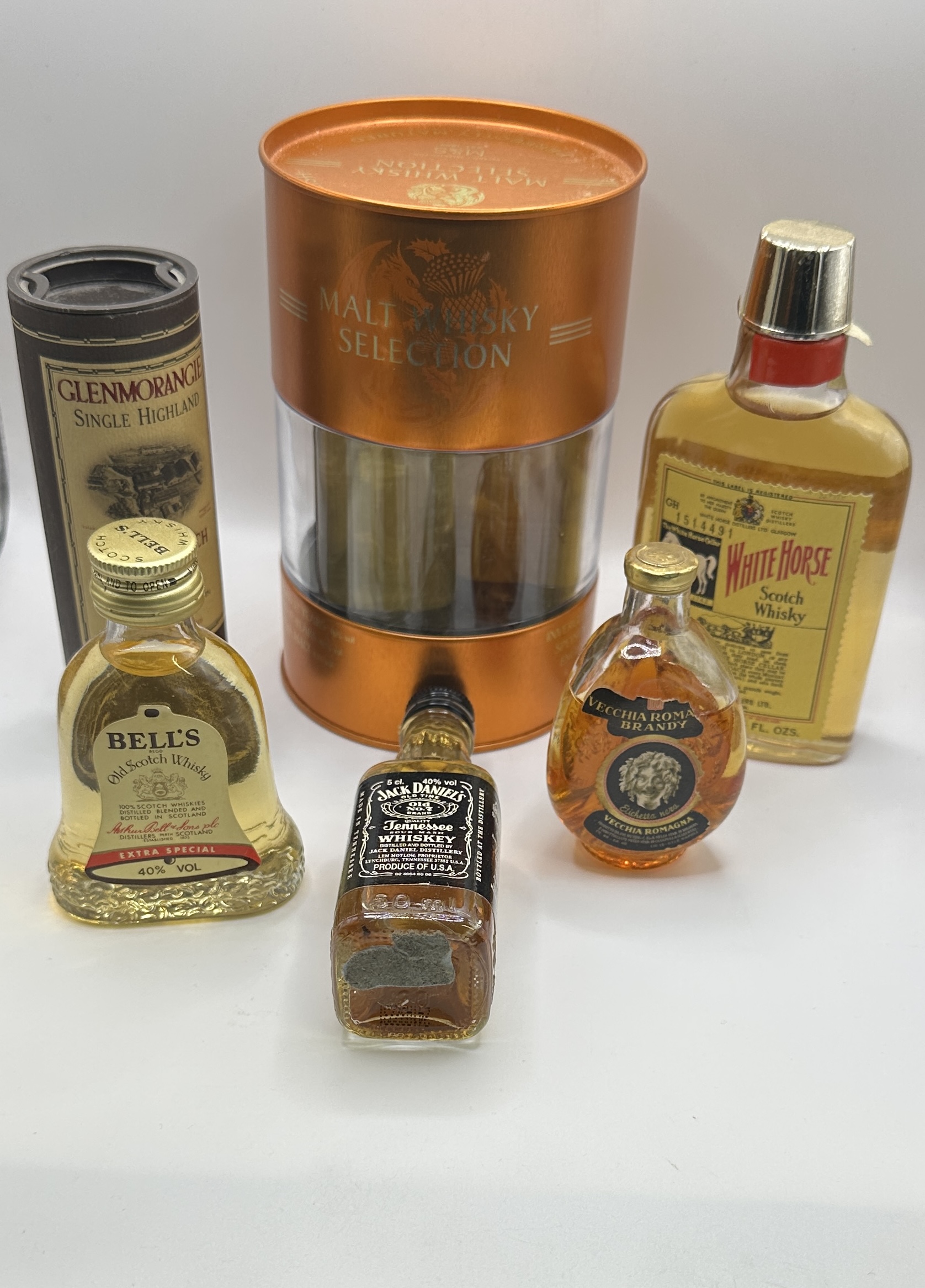 A Collection of Miniature Spirit Bottles and Selection Tin