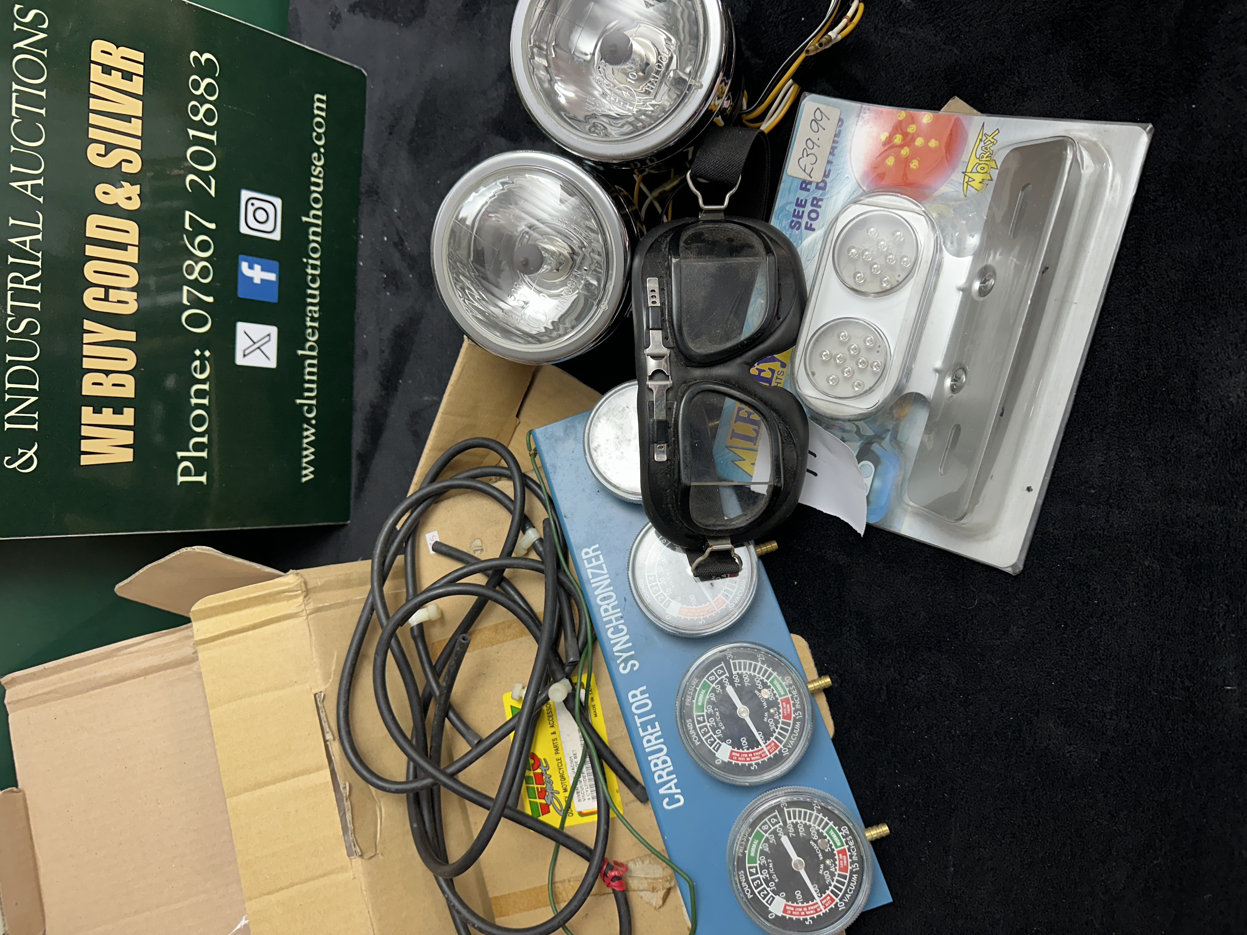 A Collection of Motorcycle Accessories and Workshop Tools including Carburettor Synchroniser and Auxiliary Lighting