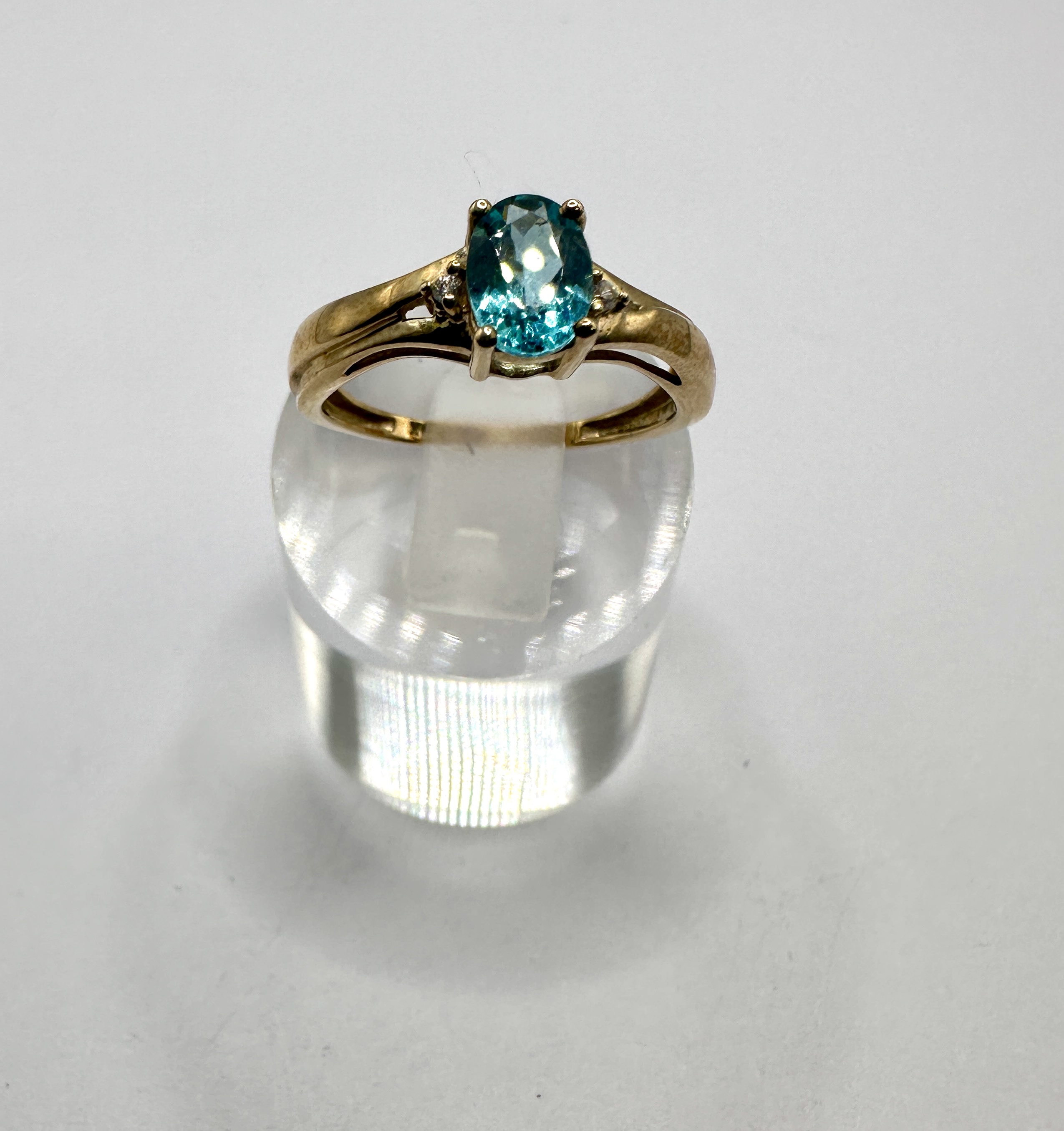 A Yellow Metal Blue Gemstone and Diamond Dress Ring
