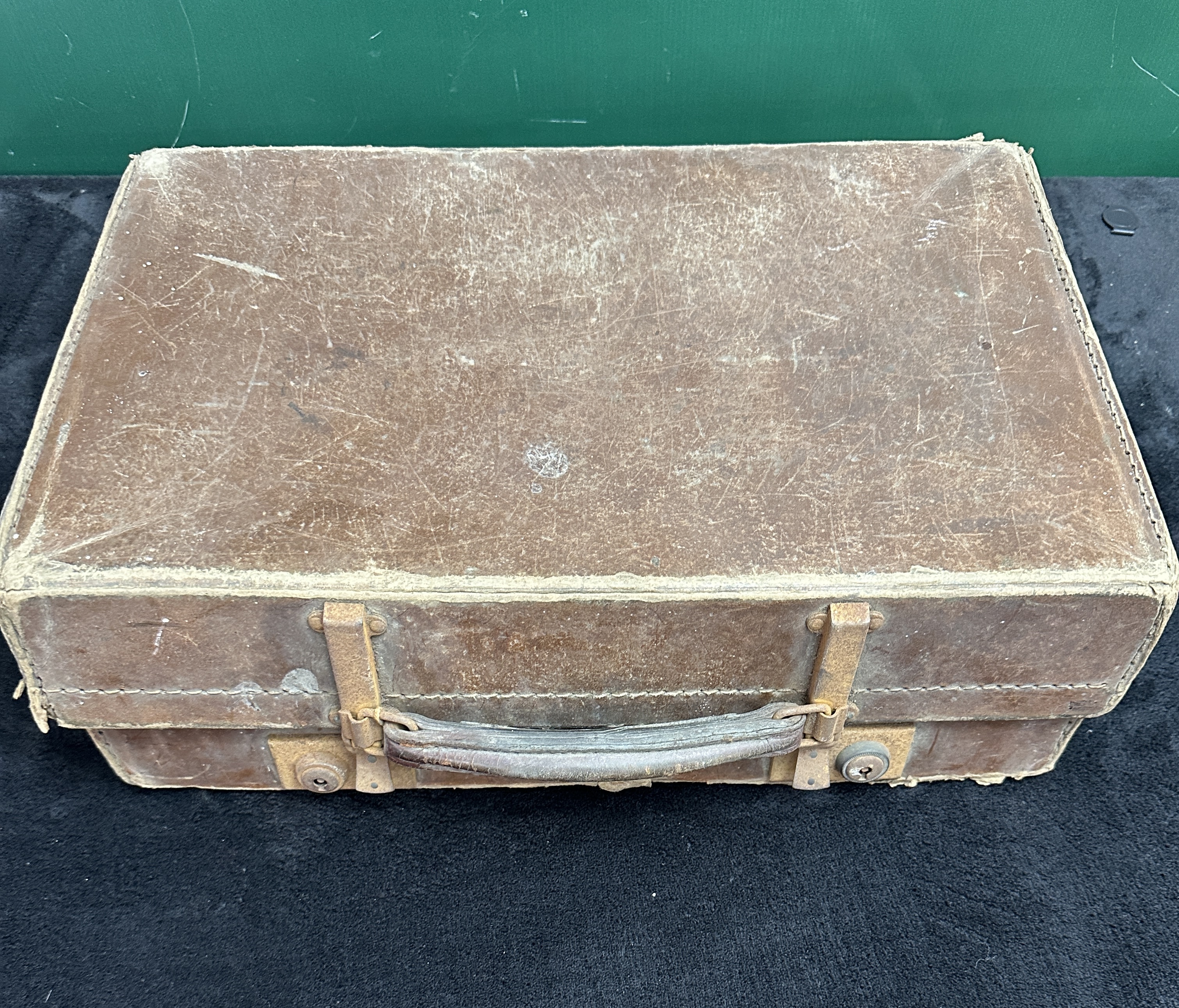An Assortment of Mid-20th Century Ephemera and Personal Effects contained within a Vintage Brown Suitcase