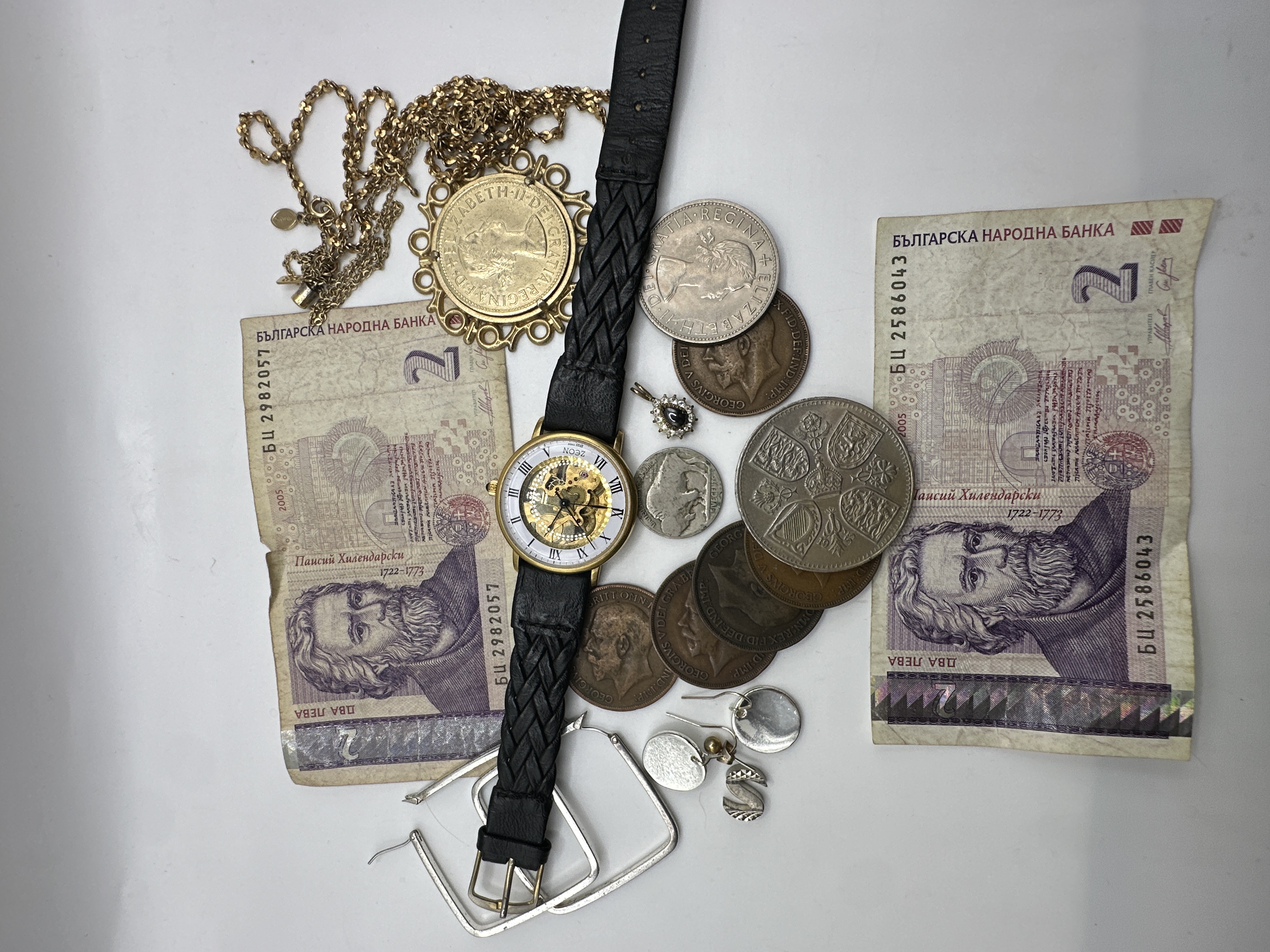 An Assortment of Collectables Including a Zeon Skeleton Mechanical Wristwatch, Bulgarian Banknotes, and Jewellery