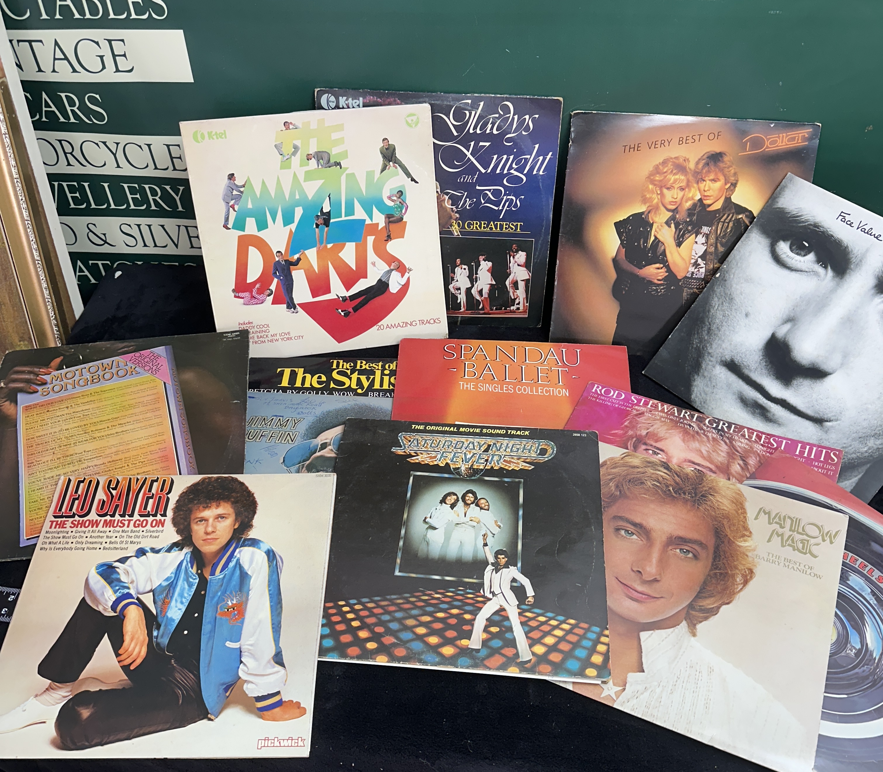 A Collection of 11 Vintage Pop and Soul Vinyl LP Records including Phil Collins and Saturday Night Fever
