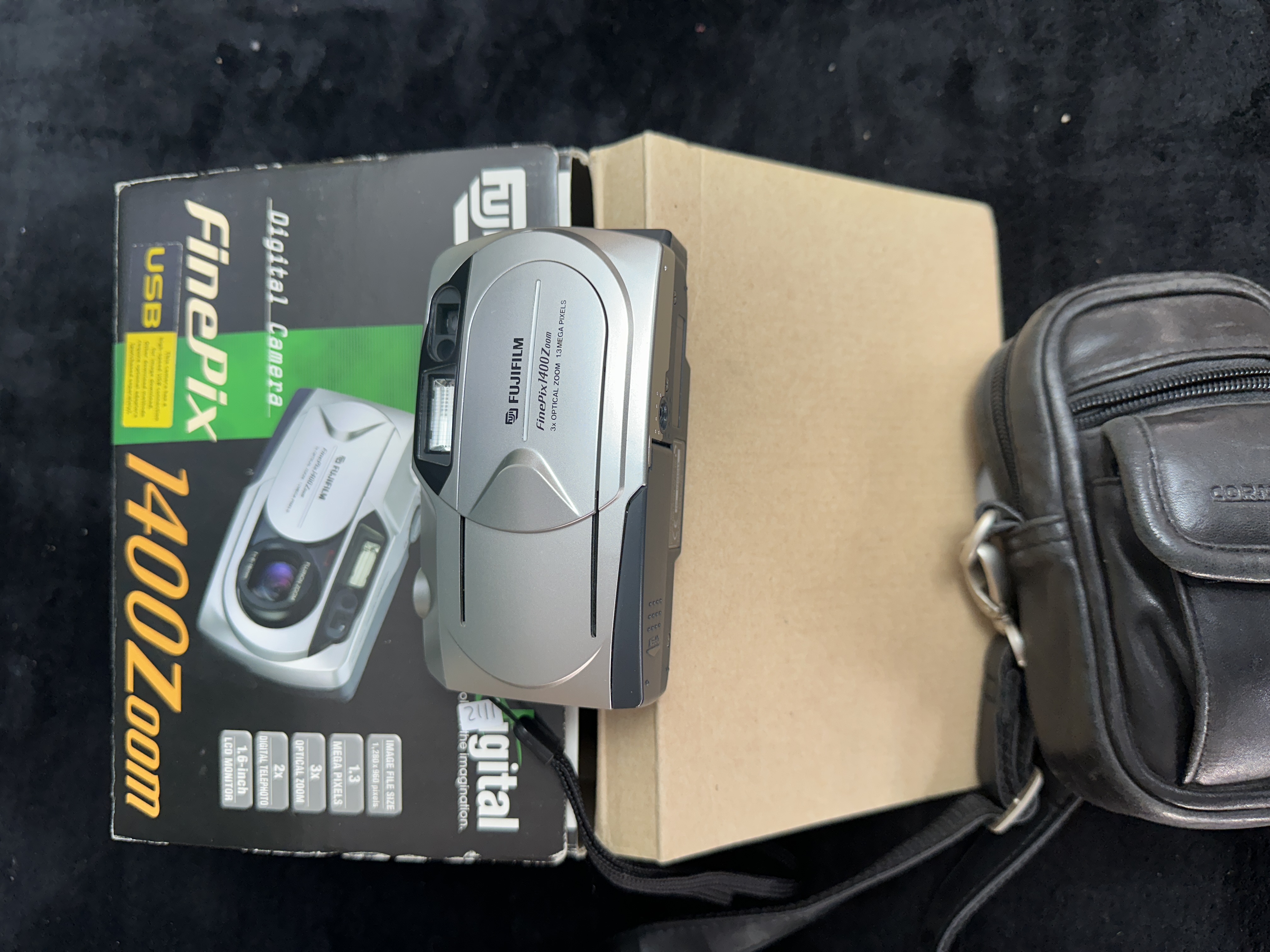 A Fujifilm FinePix 1400 Zoom Digital Camera with Original Box and Case