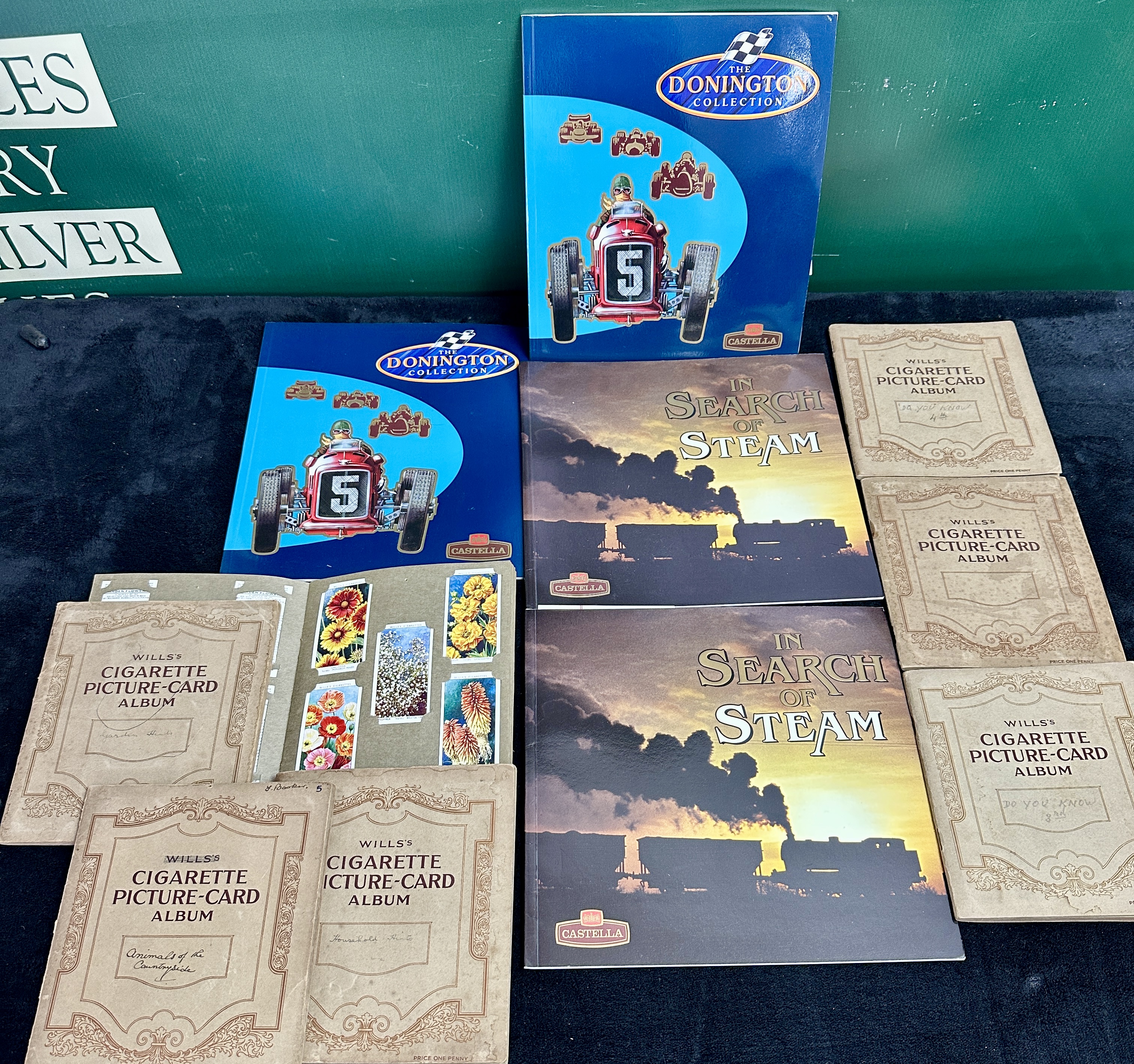 A Collection of Ten Vintage Cigarette Card and Promotional Collector Albums Including Wills and Castella