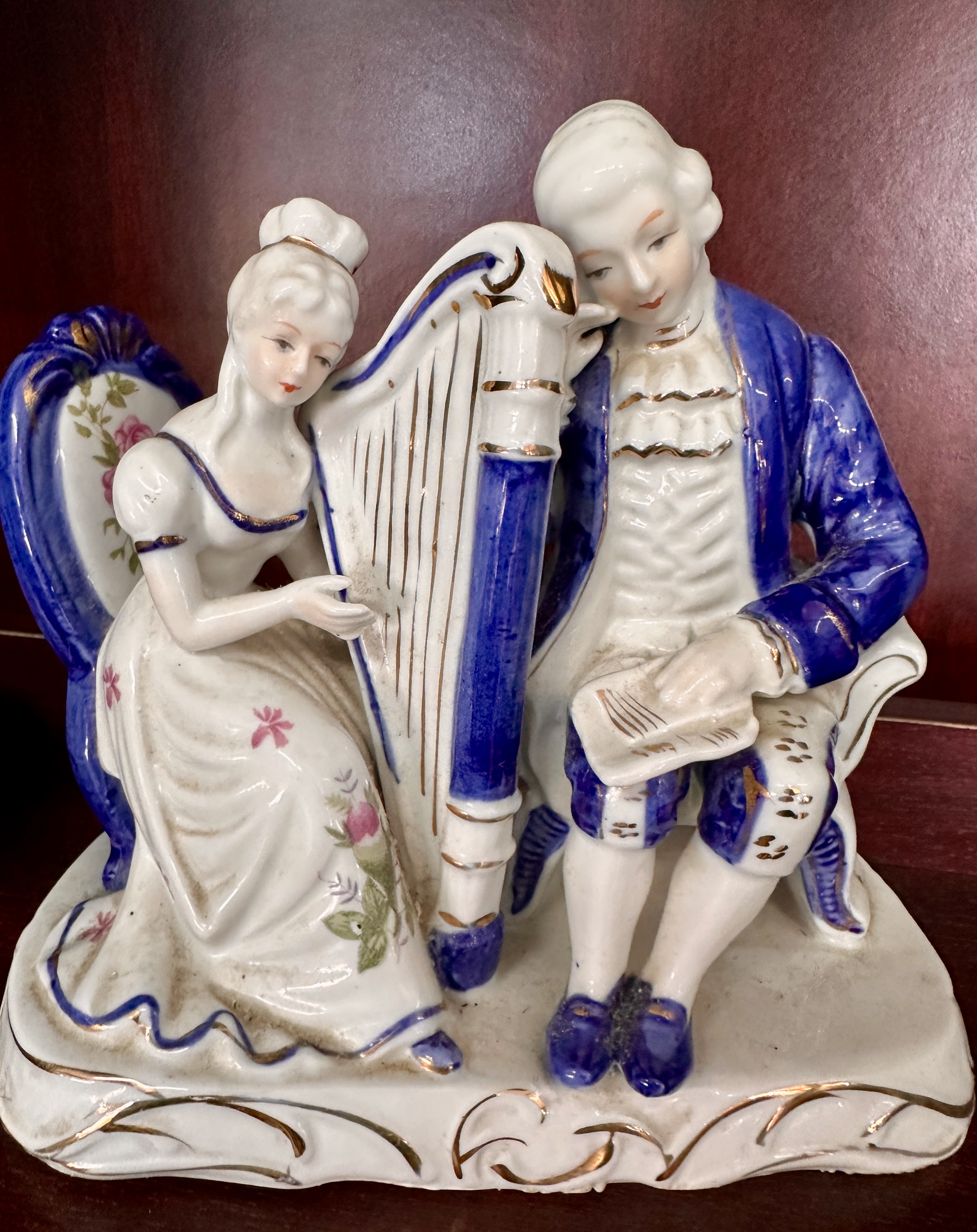 Continental Style Glazed Porcelain Figural Group of a Musical Couple