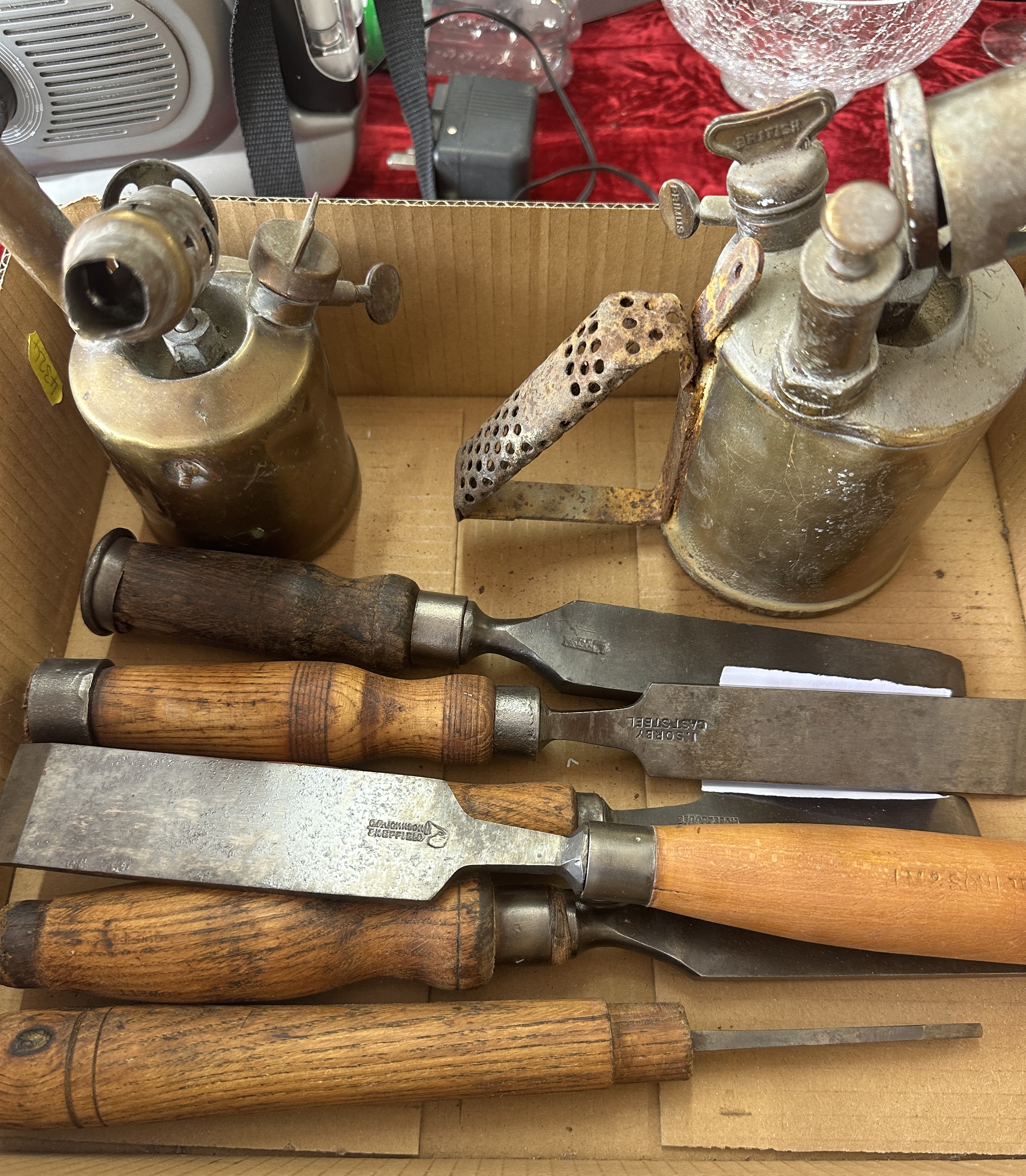 An Assortment of Vintage Brass Blowlamps and Woodworking Chisels