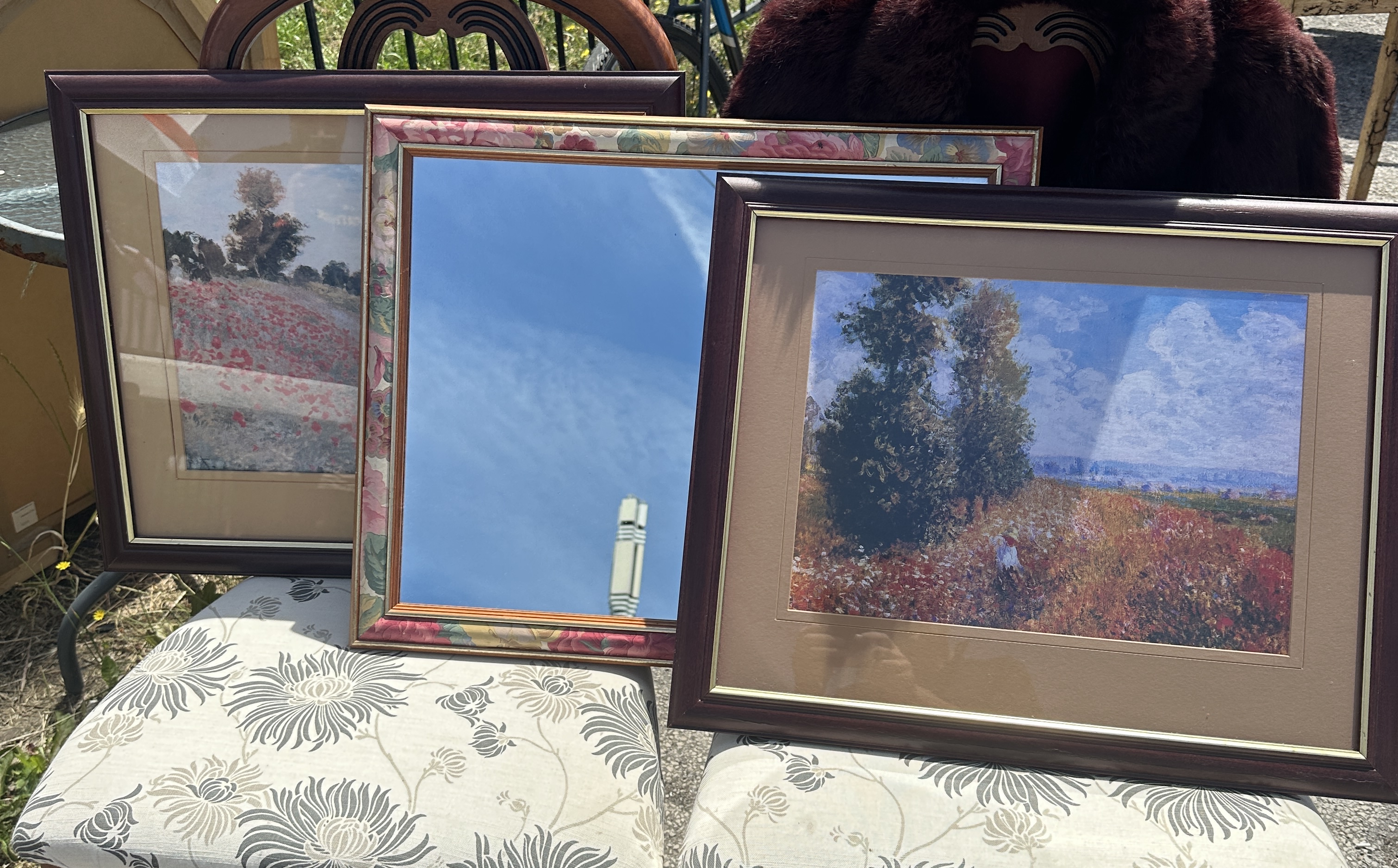 A Trio of Framed Decorative Items Comprising Two Impressionist Style Prints after Claude Monet and a Floral Patterned Wall Mirror
