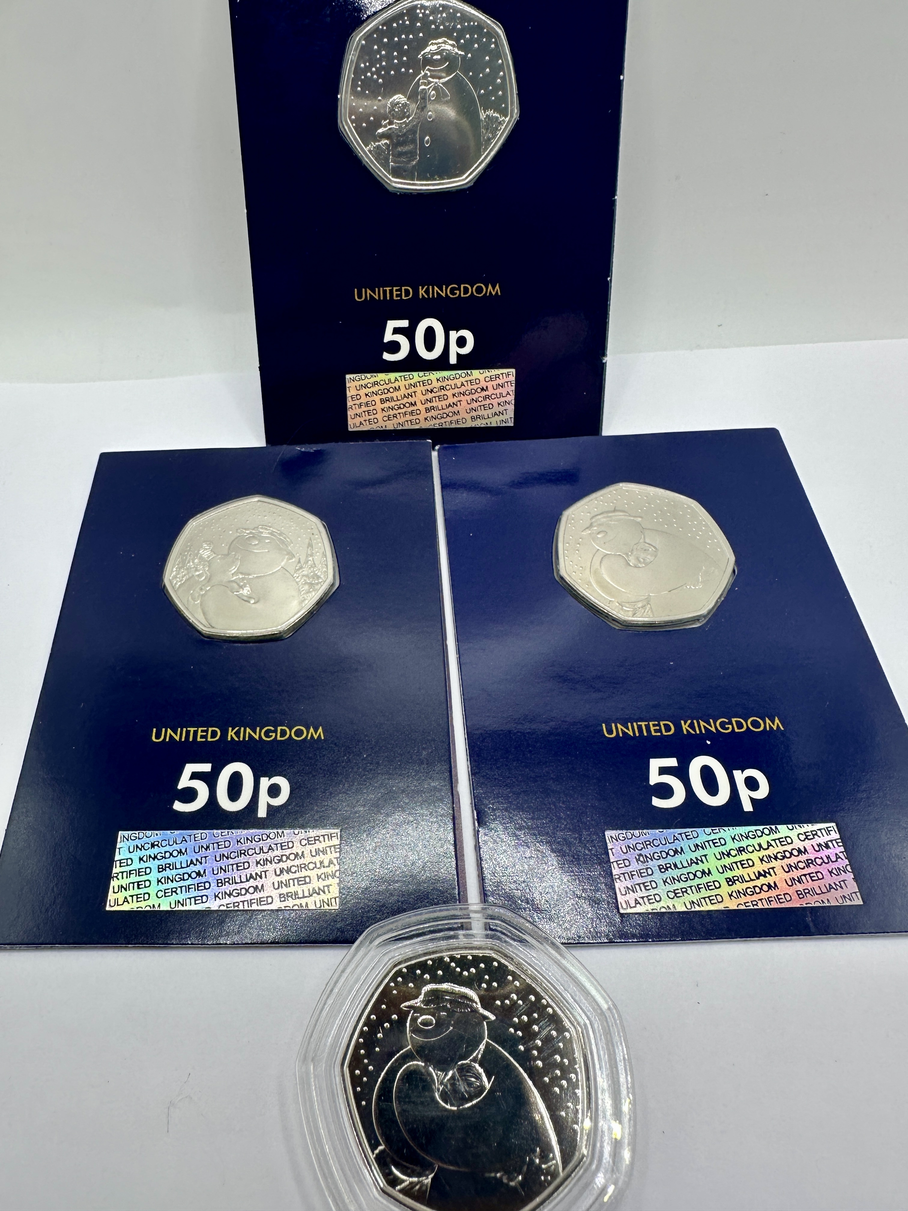 A Collection of UK The Snowman Brilliant Uncirculated 50p Coins