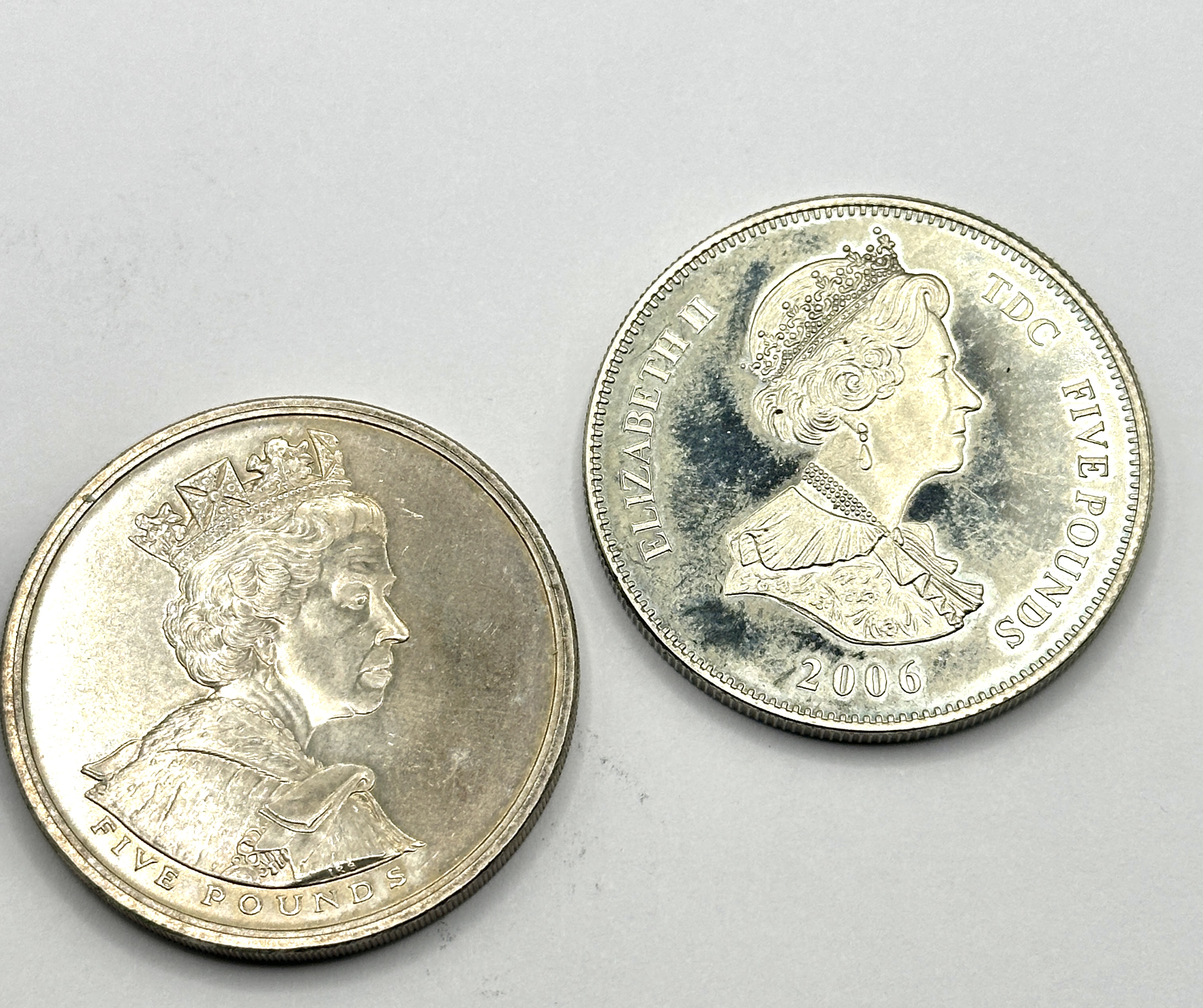 A Pair of Five Pound Commemorative Coins, UK 2002 and Tristan da Cunha 2006