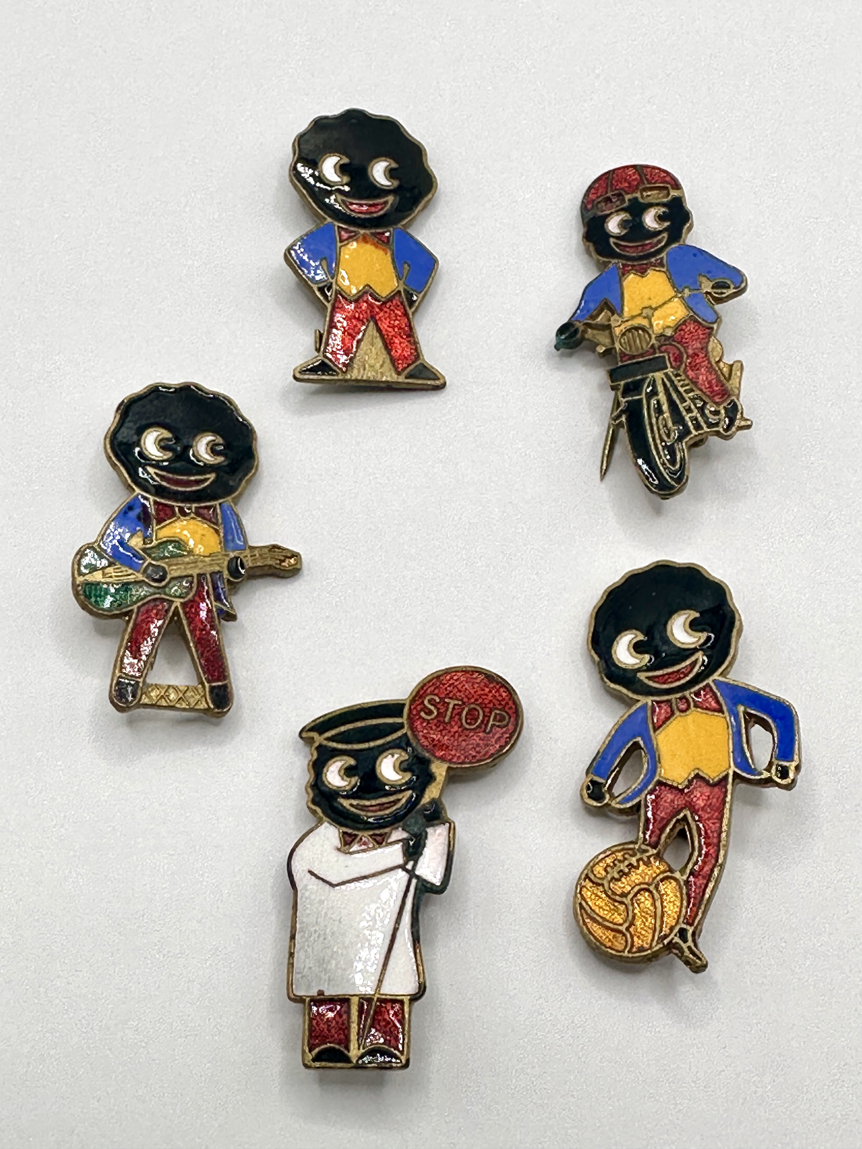 A Collection of Robertson's Golly Enamel Advertising Lapel Badges