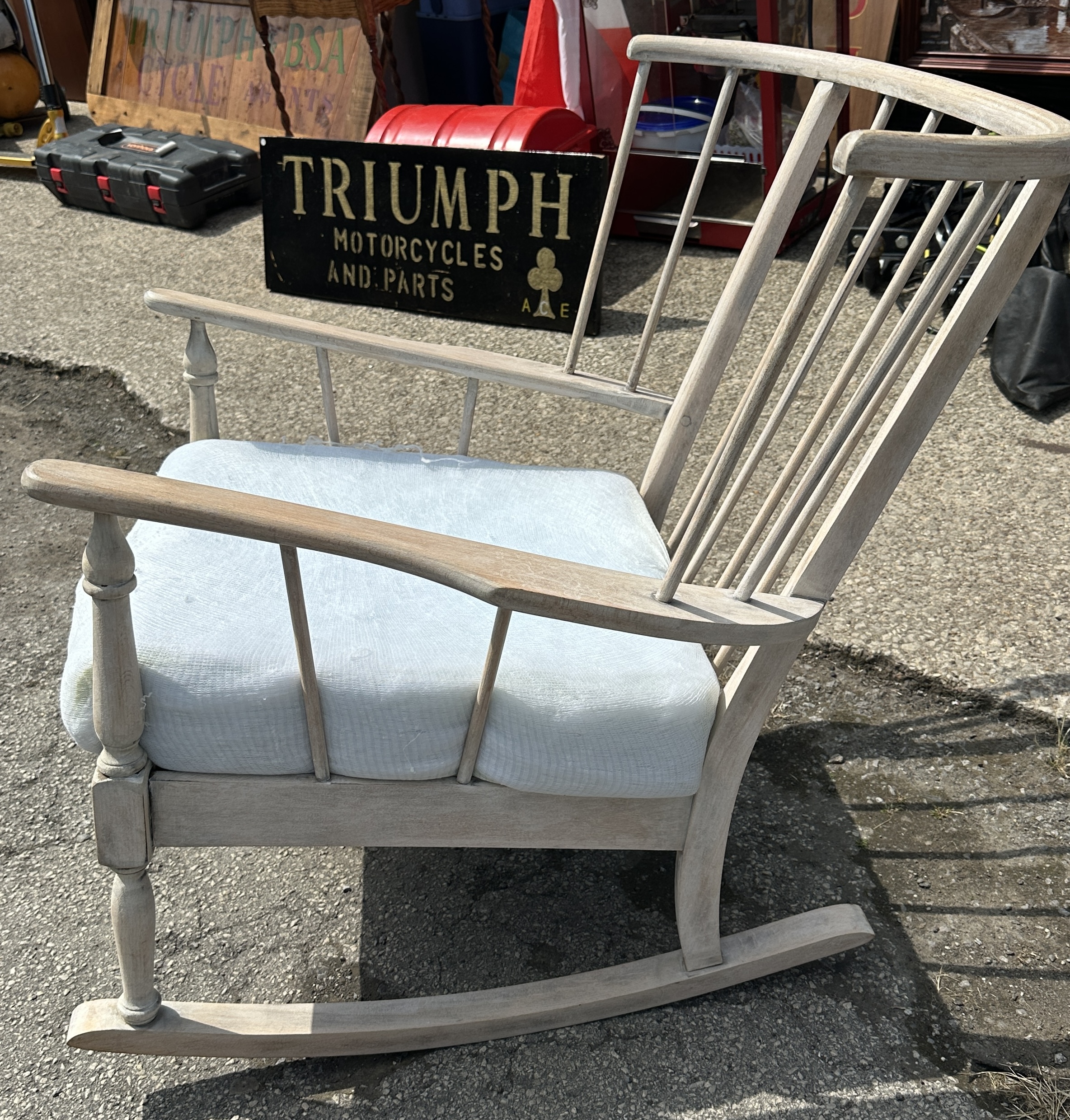 A mid-century spindle-back rocking chair