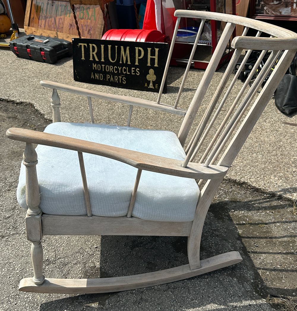 Lot 96: A mid-century spindle-back rocking chair