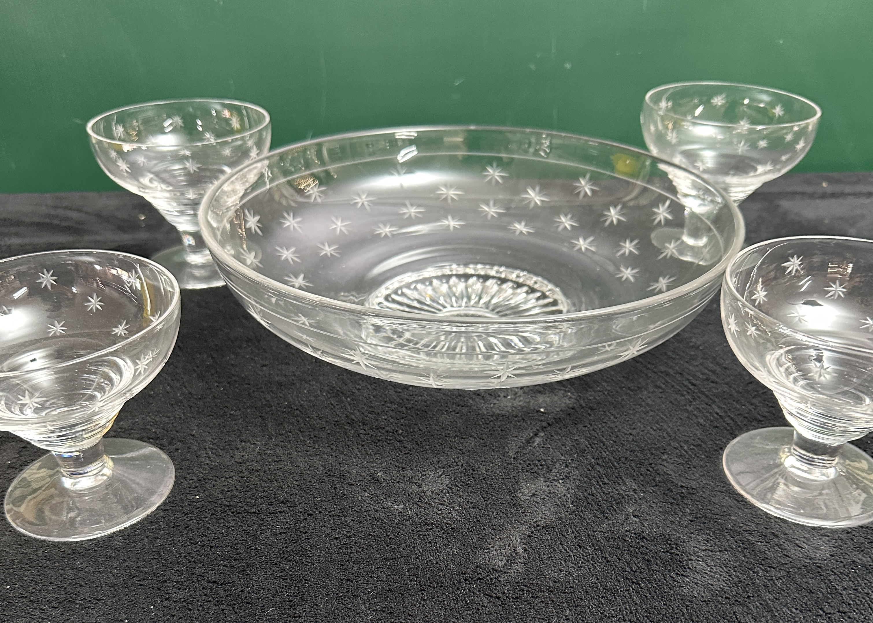 A Five-Piece Set of Stuart Crystal Startime Pattern Glassware