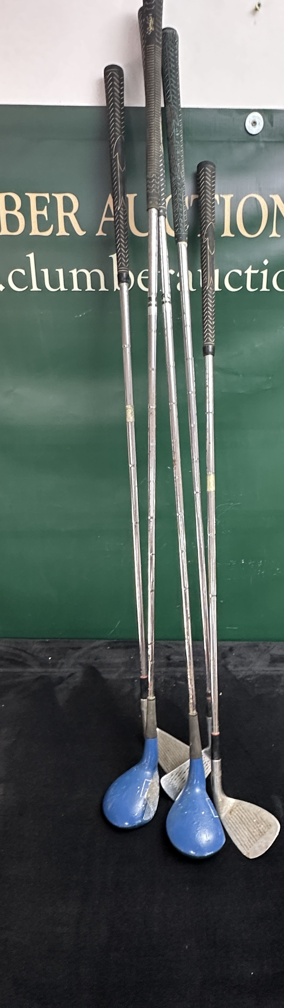 A Collection of Vintage Golf Clubs