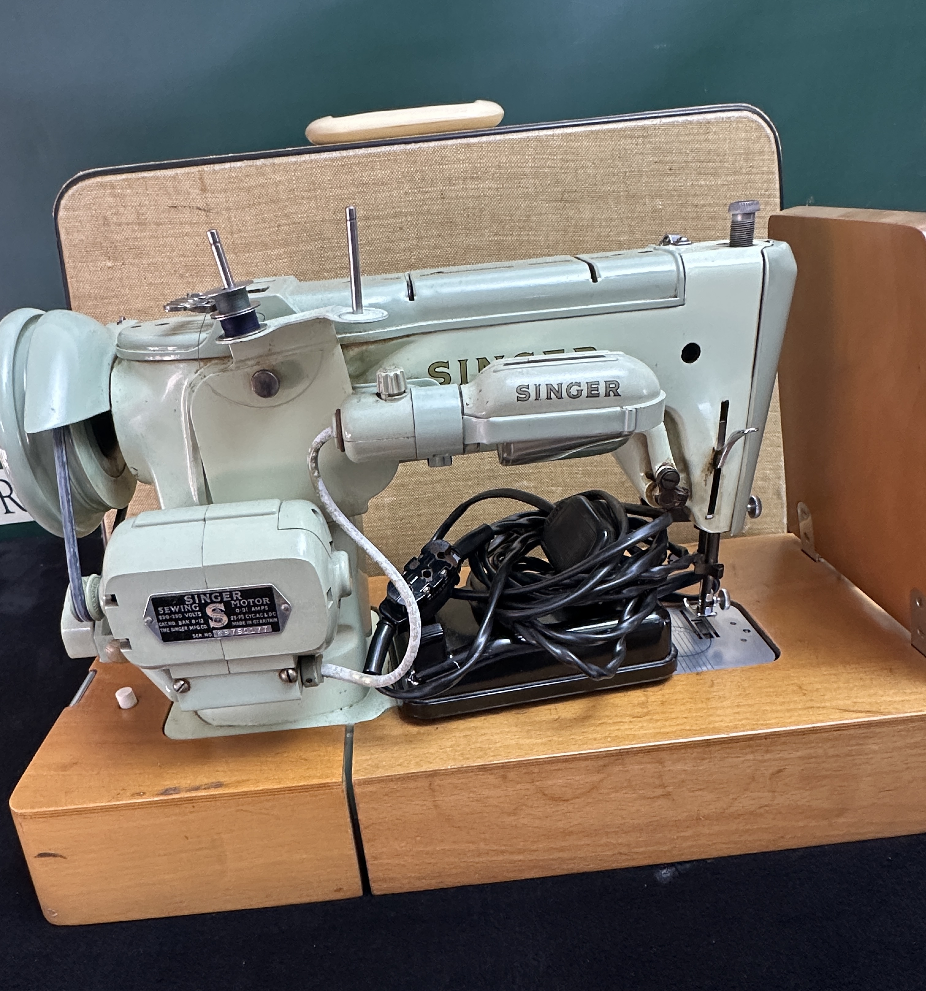 A vintage Singer 319K electric sewing machine in pale green