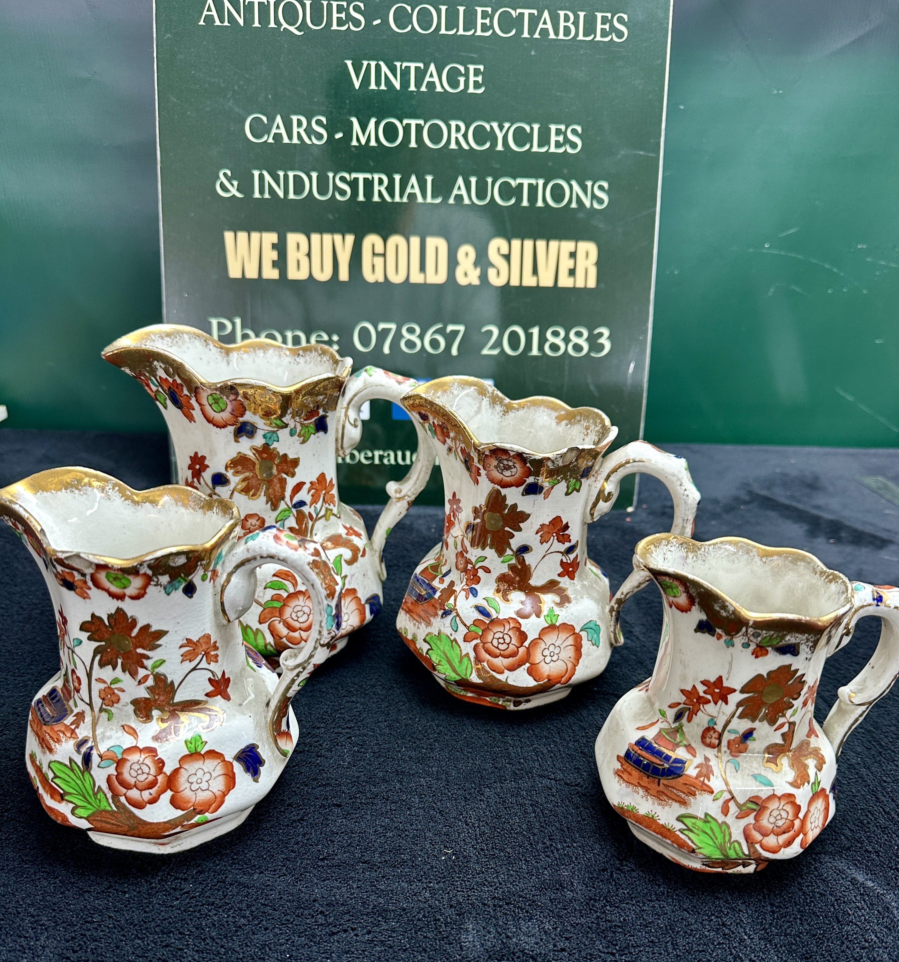 A Graduated Set of Four Amherst Ironstone Jugs in the Golden Azalea Pattern