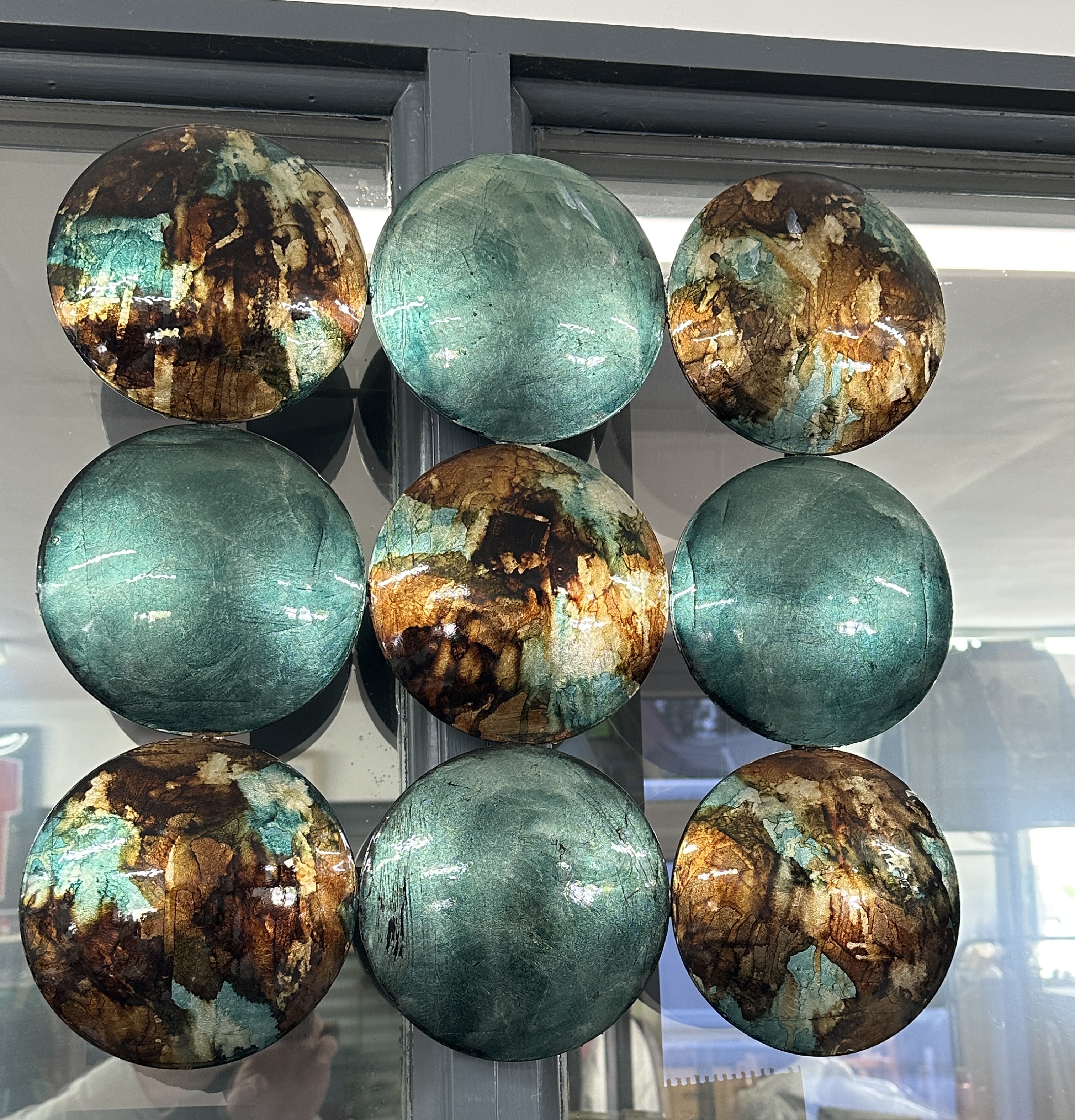 A Collection of Contemporary Decorative Glass and Metallic Wall Discs