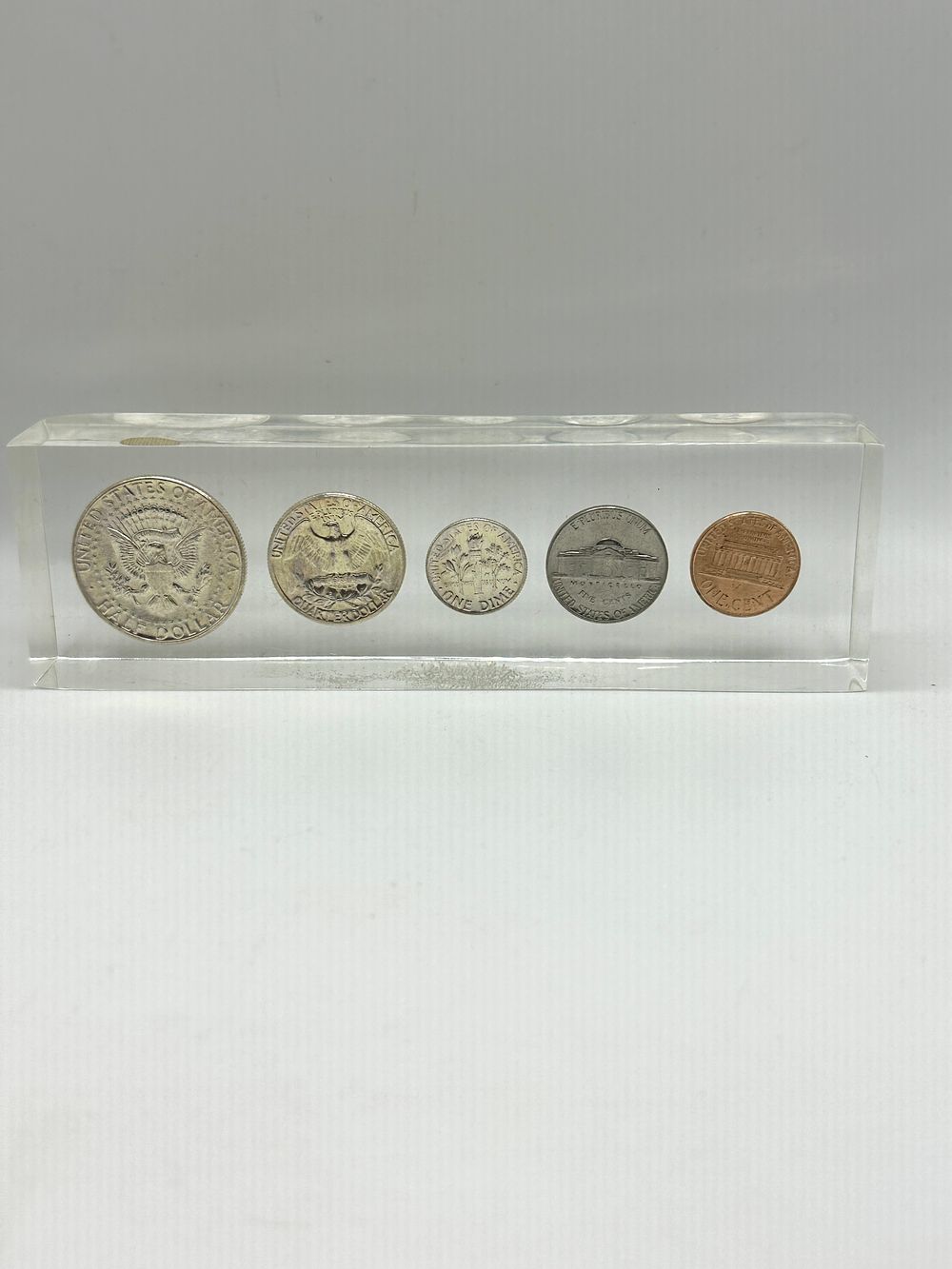 Lot 339: A Set of 1964 US Coins Encased in Acrylic
