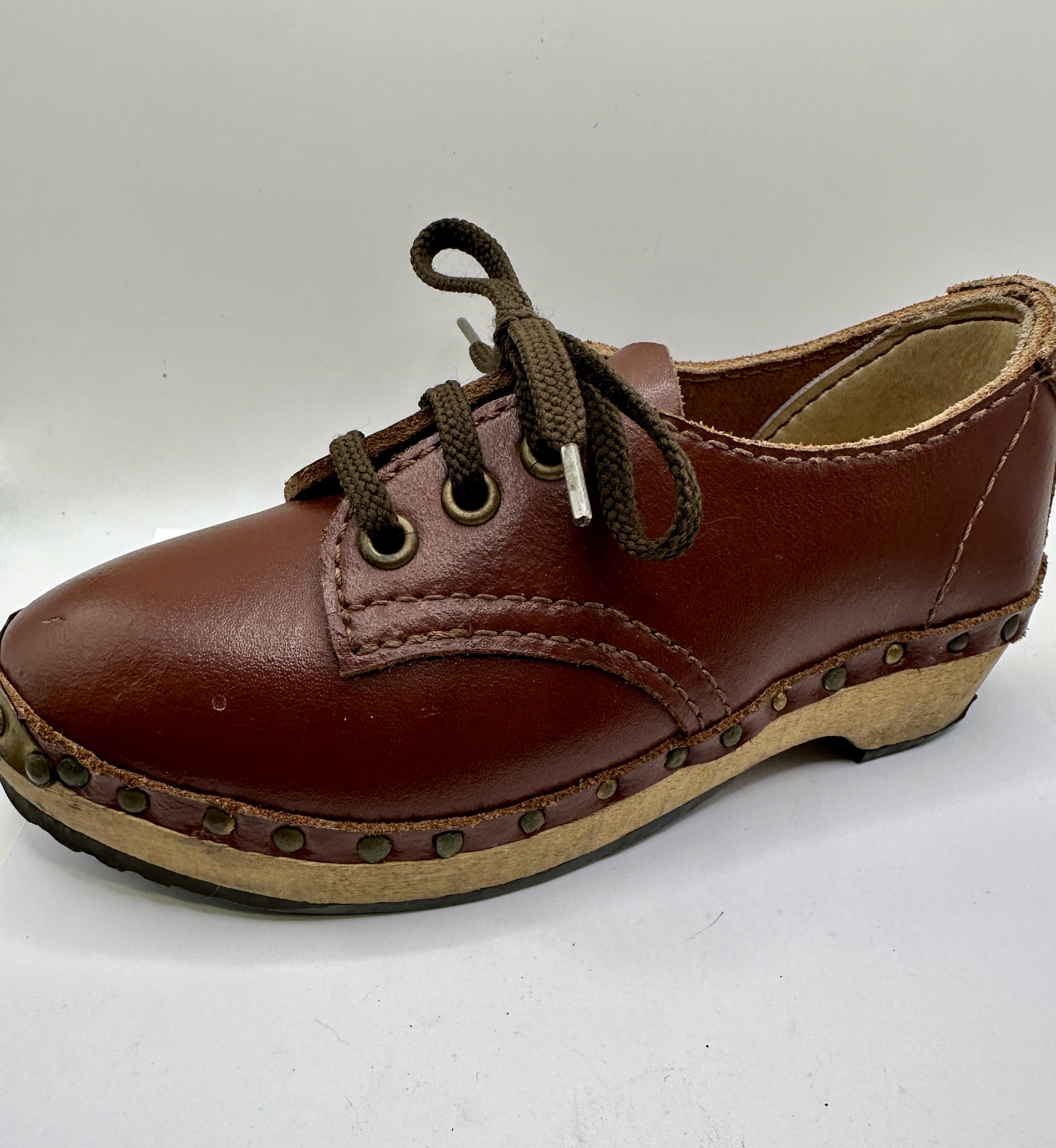A Pair of Traditional Lancashire Lace-Up Clogs with Leather Uppers and Wooden Soles