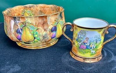 Two English decorative porcelain items including a fruit bowl in the style of Aynsley Orchard 
