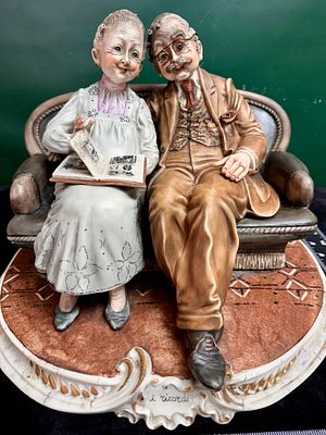Italian Capodimonte Porcelain Figurine i ricordi by Volta. A large polychrome porcelain figurine 