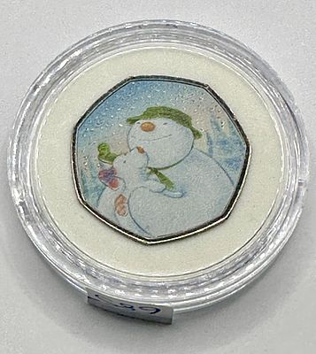 UK 2022 The Snowman and The Snowdog Colourised 50 Pence Coin. A heptagonal United Kingdom 50 