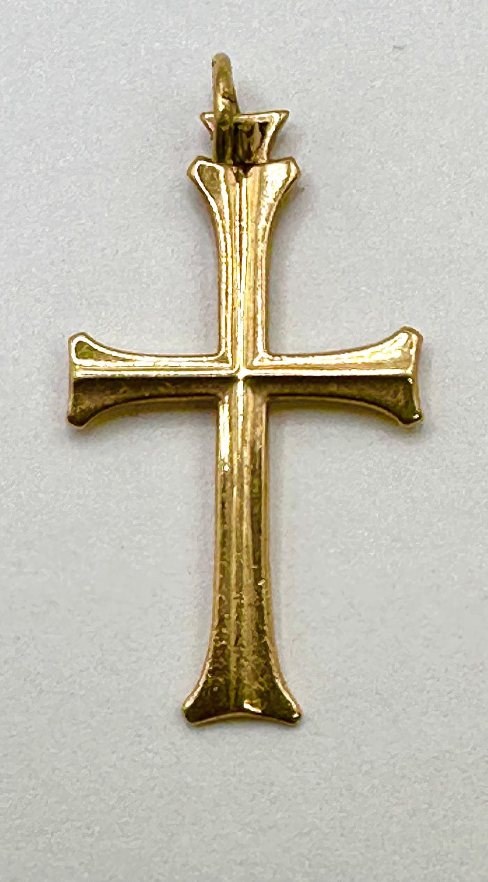 Lot 377: A Gothic-style Serenity Cross Yellow Metal Pendant