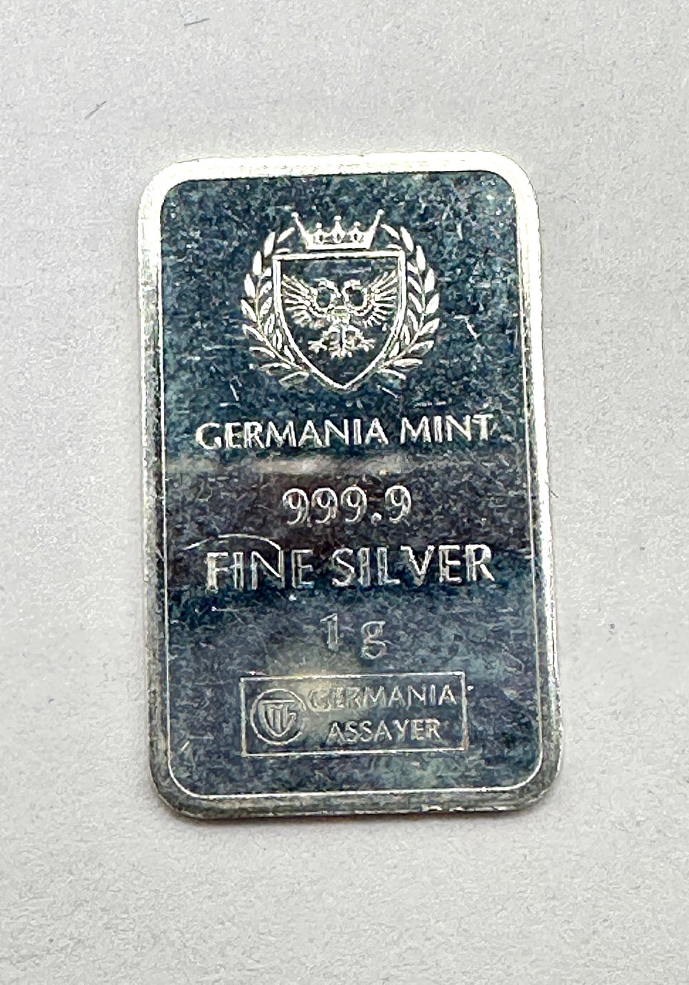 Lot 213: A Germania Mint 1 Gram .9999 Fine Silver Bullion Bar