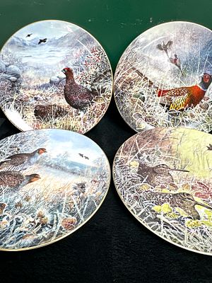 A Set of Four Wedgwood Bone China Game Birds of Britain Collection Decorative Plates. A set of 
