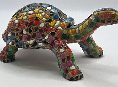 A Gaudi Mosaic Tortoise Figurine. A decorative figurine of a walking tortoise featuring a 
