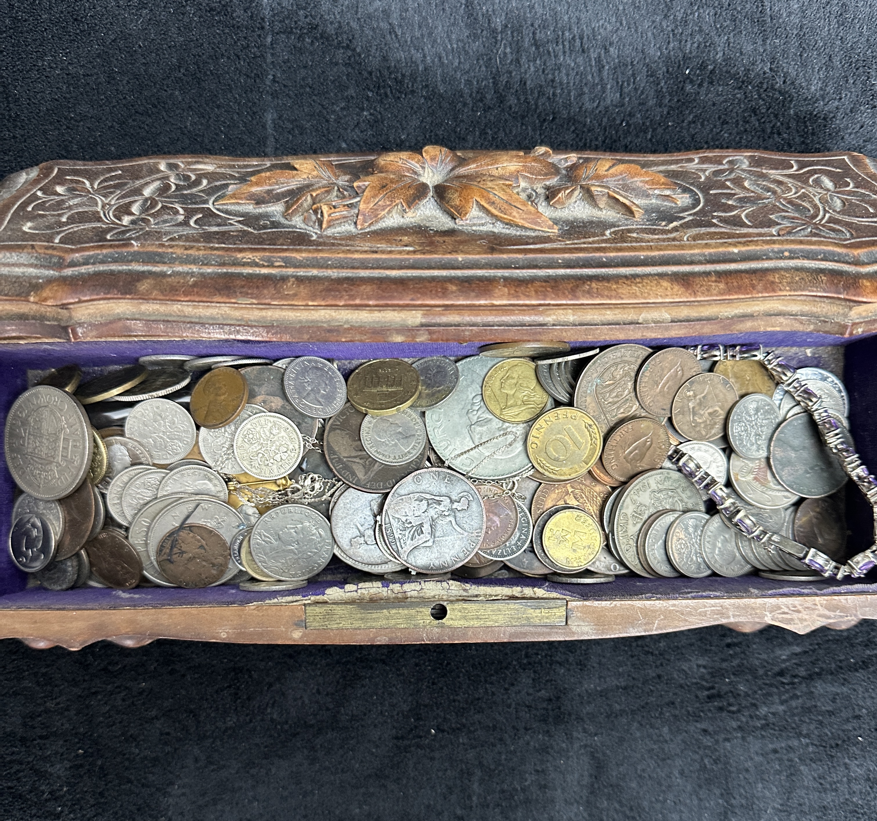 A Collection of UK and International Coins and Jewellery in a Carved Wooden Casket