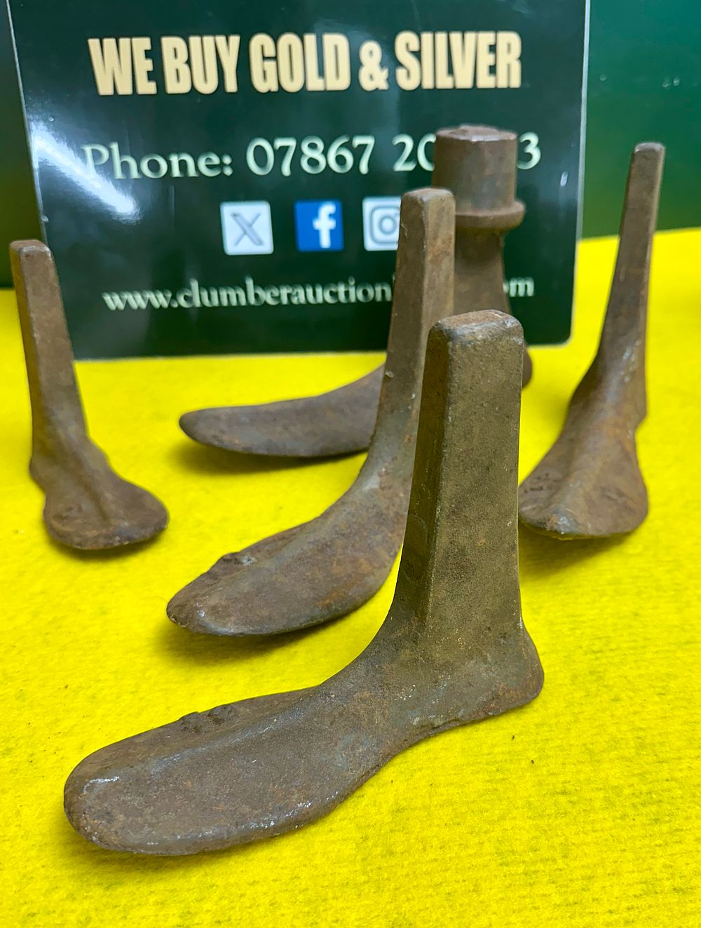 Lot 156: A Set of Five Antique Cast Iron Cobbler's Shoe Lasts and Mounting Stand
