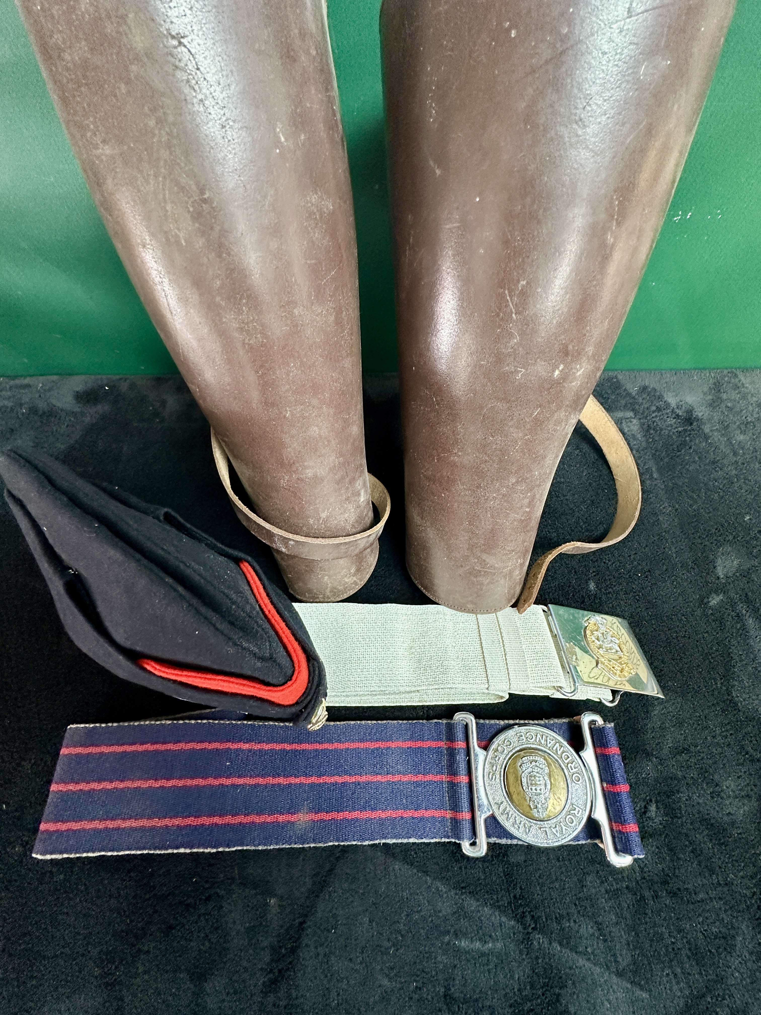 A Group of British Army Royal Army Ordnance Corps Uniform Accessories and Leather Leggings