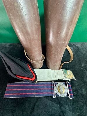 A Group of British Army Royal Army Ordnance Corps Uniform Accessories and Leather Leggings. A 