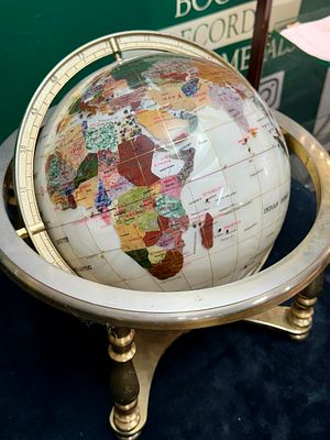 Alexander Kalifano Gemstone and Mother-of-Pearl Inlay Desk Globe on Polished Brass Stand. A 
