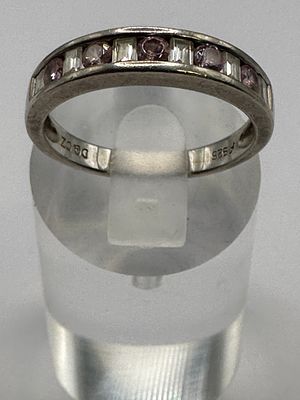 A Diamonique Sterling Silver Eternity Band with Pink and Clear Cubic Zirconia. A sterling silver 