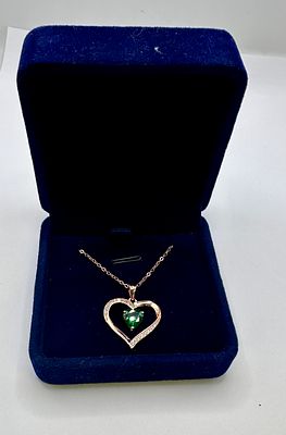 Rose Gold-Tone 925 Silver Heart Pendant Necklace with Green Gemstone. A 925 silver heart-shaped 