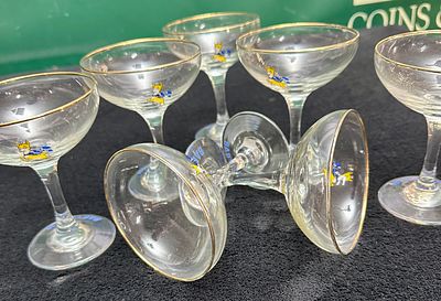 A Set of Seven Vintage Babycham Glasses. This set of seven vintage glasses was manufactured for 