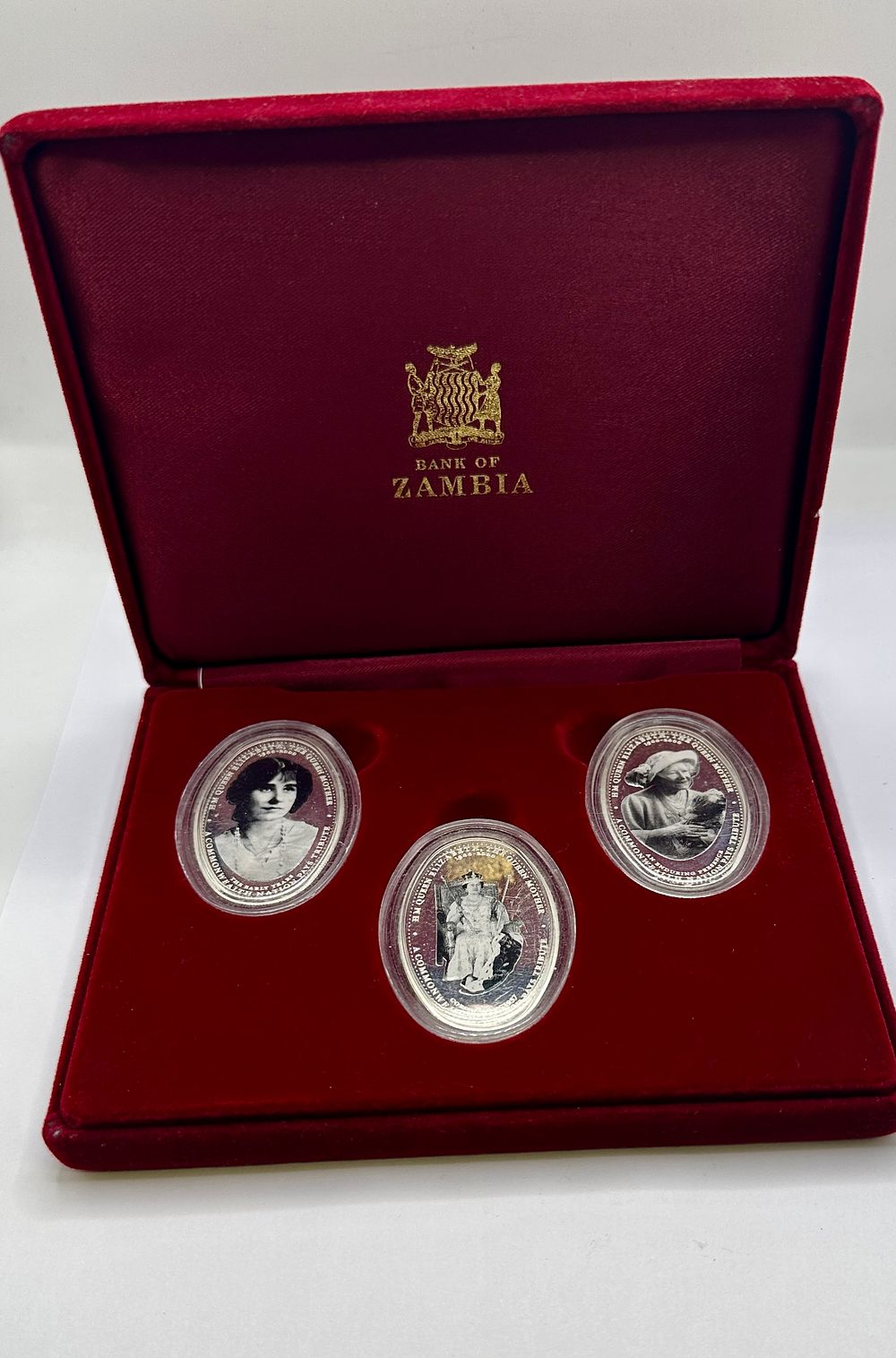 Lot 258: Three Zambia 2002 Sterling Silver Proof Oval Coins, Queen Elizabeth The Queen Mother Memorial Set