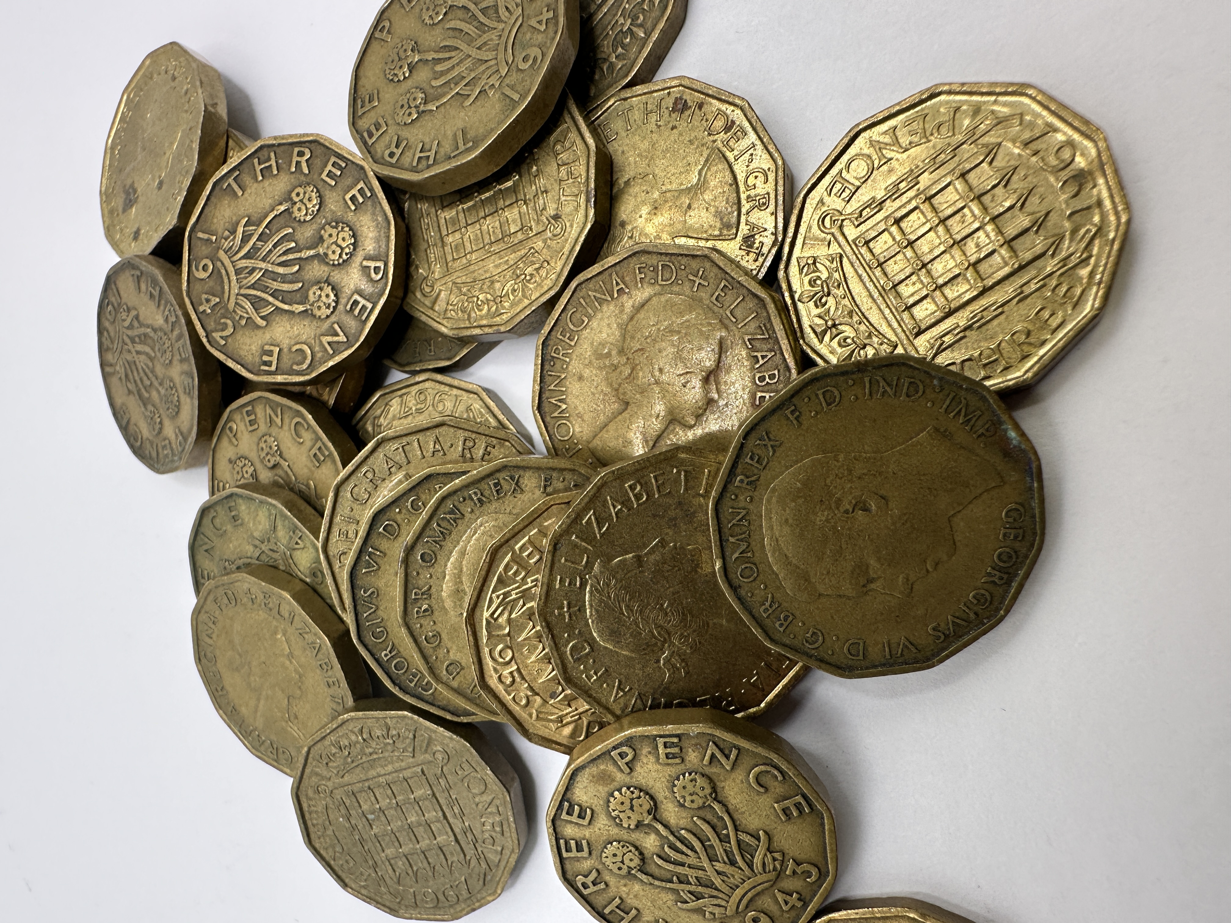 A Collection of UK George VI and Elizabeth II Nickel-Brass Threepence Coins, 1941-1967